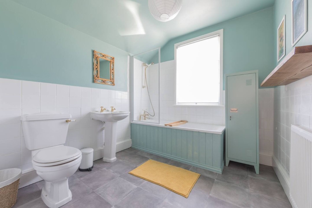 1st floor bathroom with shower over bath WC & basin - Painter Cottage