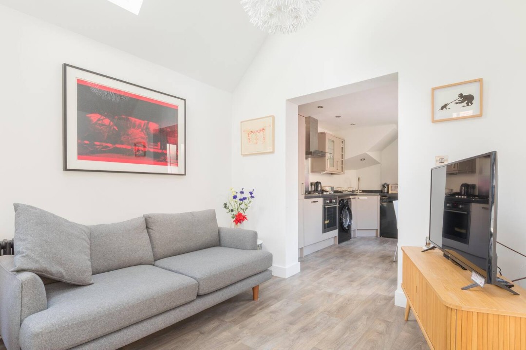Front room sofa and TV - The Old Bakery
