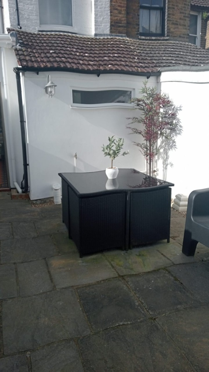 Back Garden with table and chairs - The Roost