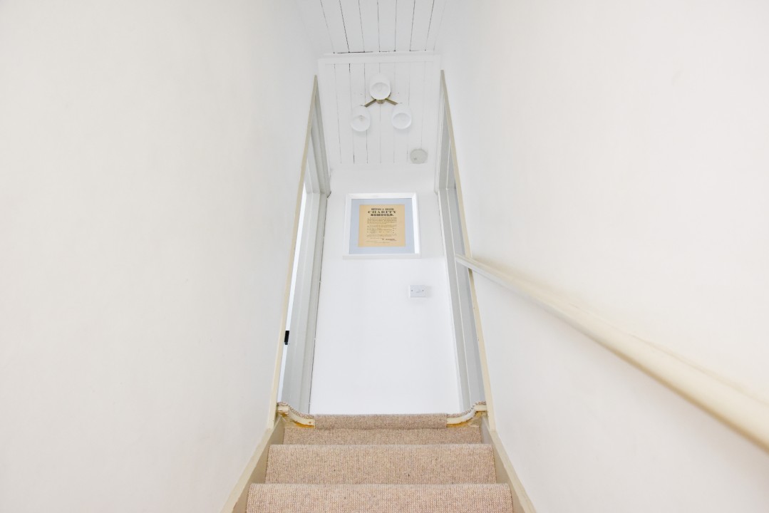 The Roost stairs to bedroom