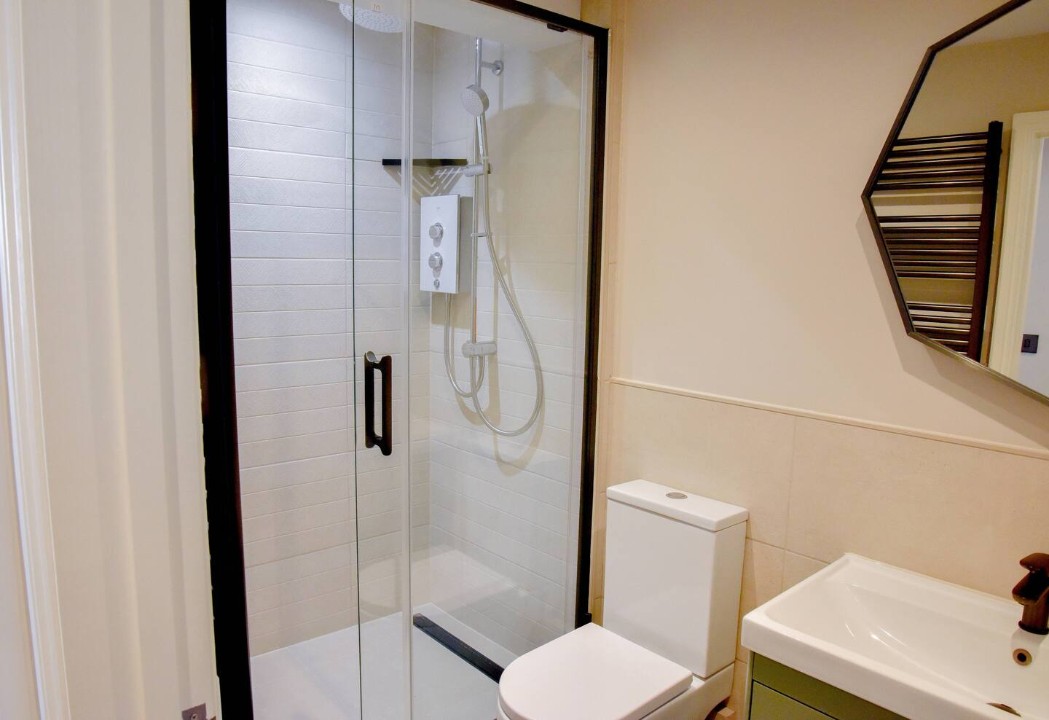 holdens cottage bathroom wiht walk in rain shower, basin and toilet