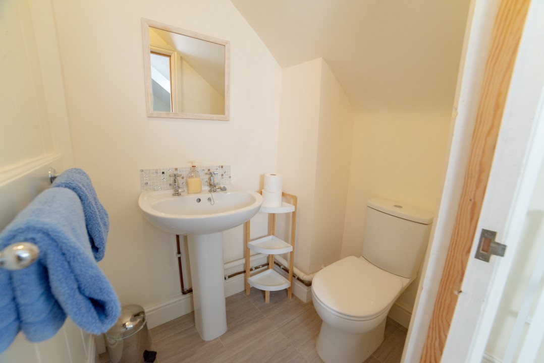 toilet and basin in attic room